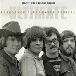 A black and white photo of the band