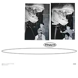 A blank white cover with two black and white images embedded in it. Both are photographs of the artist as a young child sitting on his father's shoulders. Behind the pair is a large plastic T-Rex head. Below the images is text identifying the album and artist name.