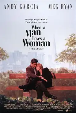 A man and a woman embracing as they sit on a bench