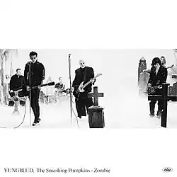 Cover art depicting a greyscale image of Yungblud and the Smashing Pumpkins performing in a graveyard.