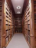 Un fond de cabinet dans la salle des boiseries, créé à la maison romaine