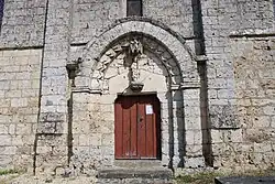 Portail latéral en tiers-point.