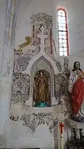 Peinture murale ornant l'autel du tabernacle.