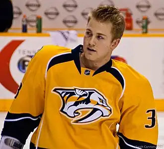 Photographie de Colin Wilson avec les Predators de Nashville