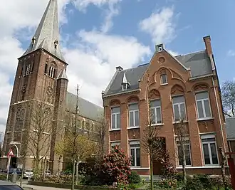 Église Saint-Roch avec presbytère (Deurne).