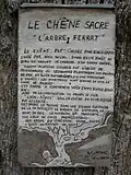 Écriteau anonyme cloué sur l'arbre[68].