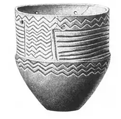 Vase à haut col. Décor de zig-zag horizontaux, ou de « vagues ».