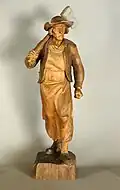 Bûcheron sculpté en pin suisse par Josef Moroder-Lusenberg.