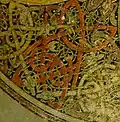 Détail des entrelacs et décors zoomorphiques du Khi-Rhô du livre de Kells.