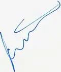 Signature de Timo Scheider avec une encre bleue.