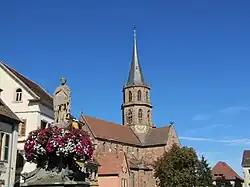 Eglise avec la fontaine Saint Maurice