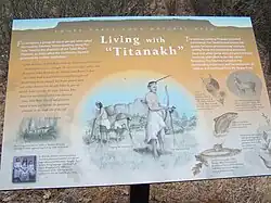 Panneau éducatif intitulé « Living with "Titanakh" ».