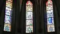 La légende au centre entourée de Notre Dame de Lourdes et Notre Dame de Pontmain.