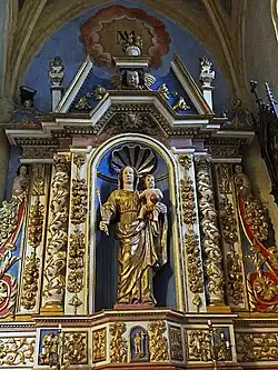 Retable de la Vierge dans la chapelle latérale Sud.