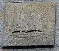 Poulgoazec : bateau sculpté sur l'un des murs de l'église paroissiale Saint-Julien-le-Passeur représentant probablement une carvelle.