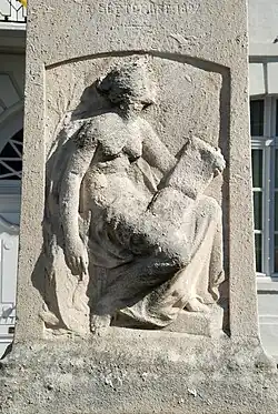 Allégorie de la Belgique inscrivant le nom de Jenneval au livre de l'Histoire.