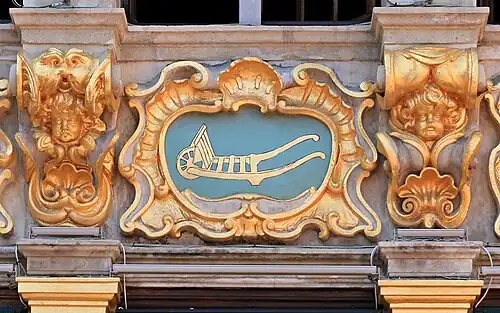 L'enseigne à la brouette.