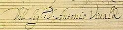 Belle écriture déliée sur papier ligné.