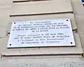 la plaque sur le portail des manèges