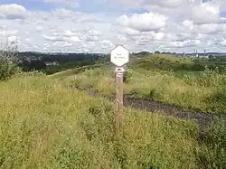 Panneau d'indication sur le terril Bayemont-Saint-Charles.