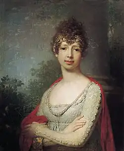 Portrait en buste d'une femme somptueusement vêtue.
