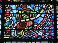 Baie 9, détail d'un phylactère qui porte l'inscription « CLEMENS VITREARIUS CARNOTENSIS M(E FECIT) »