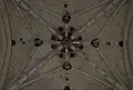 Détail de la croisée du transept (la clé de voûte représente la Trinité) entourée de chérubins et des 4 évangélistes