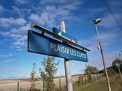 Panneau indiquant le nom de la gare.
