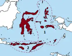 L'aire géographique Wallacea est représentée en couleur bordeaux. On distingue l'une des îles des Célèbes, Sulawesi, en haut, à gauche de la zone de Wallacea. 1 - L'ensemble insulaire des Moluques. 2 - Le groupe insulaire des Petites îles de la Sonde, dont l'île de Florès.
