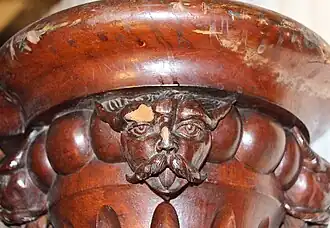 Détail d'un mascaron du balustre du premier étage de l'escalier principal (1862)