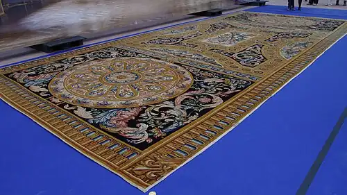 Tapis tissé en 1664 pour la galerie d'Apollon au Louvre.