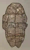 Écriture ossécaille.