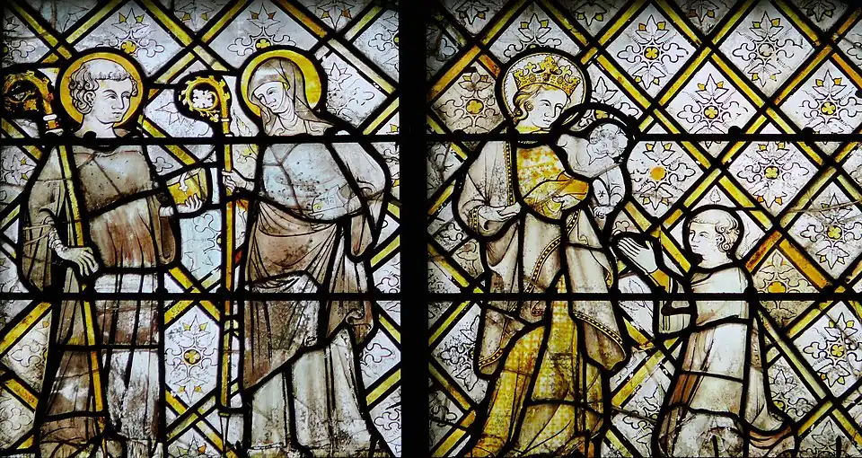 Cathédrale de Chartres, Transept, Vitrail de la Vie de saint Appolinaire. Partie en grisaille de la partie inférieure : le chanoine Thierry agenouillé devant la Vierge à l'Enfant, 1328.