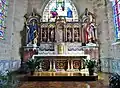 Église Saint-Gilles d'Elliant : le maître-autel (son retable représente les Quatre Évangélistes).