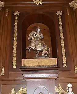 Groupe sculpté saint Martin et le pauvre en bois taillé polychrome du XVIIe siècle .