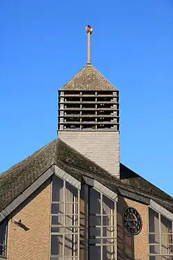 Le clocheton surmonté de « La Cité ».
