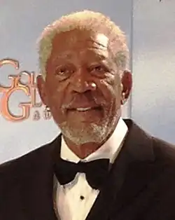 Morgan Freeman (Lucius Fox)