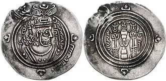 Photographie d'un dirham à l'effigie de Muʿāwiyah Ier