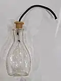 Biberon "Robert" en verre avec tige et tétine en caoutchouc, de fin du XIXe siècle.