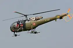 Sud-Aviation SA316 Alouette III avec une poutre de queue carénée.