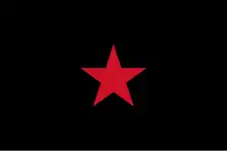 Une étoile rouge sur fond noir.