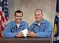 Portrait de l'équipage de Gemini 11 le 4 novembre 1965.