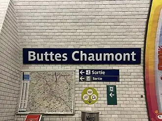 Plaque émaillée indiquant le nom de la station.