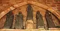 Coat-Méal : église paroissiale Notre-Dame-des-Sept-Douleurs, porche, statues 1.