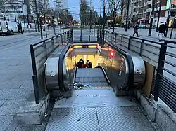 L'accès no&nbsp;2 « Boulevard Masséna », escalier mécanique.