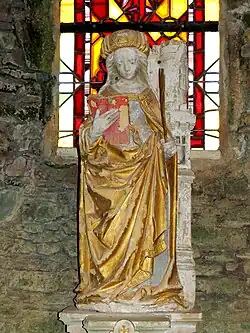 Statue de sainte Barbe en pierre polychrome du XVIe siècle.