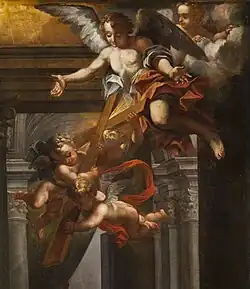 Des putti portent la croix de bois rayonnante que semble leur avoir donnée un ange, les bras ouverts.