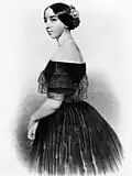 Portrait gravé d'une jeune femme profil gauche.