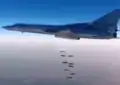 Largage de bombes de 250&nbsp;kg par un Tu-22M russe en 2016 au-dessus de la Syrie.