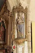 Statue de Notre-Dame de Confort et ex-votos de remerciement.